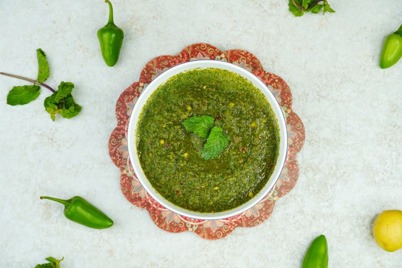 Fresh green pudina chutney with mint leaves and green chillies